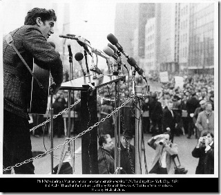 Phil Ochs during a Vietnam moratorium demonstration outside U.N. Building (New York City, 1967). 
"Phil Ochs: There but for Fortune", a film by Kenneth Bowser. A First Run Features release. 
Photo by Michael Ochs.
