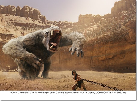 "JOHN CARTER"..L to R: White Ape, John Carter (Taylor Kitsch)..©2011 Disney. JOHN CARTERª ERB, Inc.