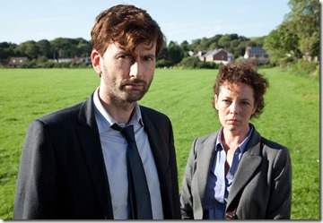 NEW SERIES

BROADCHURCH FOR ITV

EPISODE 2

Broadchurch is a new eight part drama series by Kudos Film and Television for ITV. The star-studded cast includes David Tennant, Olivia Colman, Andrew Buchan, Jodie Whittaker, Vicky McClure, Pauline Quirke, Will Mellor, Arthur Darvill and Carolyn Pickles.

This brand new eight part series is written and created by Chris Chibnall (Law and Order: UK, Doctor Who) and will explore what happens to a small community in Dorset when it suddenly becomes the focus of a police investigation, following the tragic and mysterious death of an eleven year old boy under the glare of the media spotlight.

Bloodied and dirty, Danny Latimer (Oskar McNamara) has been found dead on an idyllic beach surrounded by rocks and a jutting cliff-face from where he may have fallen. Whilst his death remains unresolved, the picturesque seaside town of Broadchurch is at the heart of a major police investigation and a national media frenzy.



Pictured : DAVID TENNANT as Alec Hardy and  OLIVIA COLMAN as Ellie Miller.

Copyright: ITV
This photograph is (C) ITV Plc and can only be reproduced for editorial purposes directly in connection with the programme or event mentioned above, or ITV plc. Once made available by ITV plc Picture Desk, this photograph can be reproduced once only up until the transmission [TX] date and no reproduction fee will be charged. Any subsequent usage may incur a fee. This photograph must not be manipulated [excluding basic cropping] in a manner which alters the visual appearance of the person photographed deemed detrimental or inappropriate by ITV plc Picture Desk.  