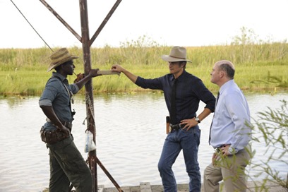 JUSTIFIED -- A Murder of Crowes -- Episode 501 (Airs Tuesday, January 7, 10:00 pm e/p) -- Pictured: (L-R) Edi Gathegi as Jean Baptiste, Timothy Olyphant as Deputy U.S. Marshal Raylan Givens, David Koechner as Deputy Marshall Gregg Sutter -- CR: Guy D'Alama/FX 