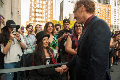 Danny Elfman greeting fans on the black carpet at opening night of DANNY ELFMAN'S MUSIC FROM THE FILMS OF TIM BURTON; conducted by John Mauceri with special guests, Danny Elfman, Sandy Cameron- violinist, Ingrid Michaelson and John-Dominick Mignard and Leif Christian Pedersen, boy sopranos. LINCOLN CENTER FESTIVAL 2015. Photographed July 6, 2015 on Josie Robertson Plaza at Lincoln Center, New York City. Photo credit: Stephanie Berger