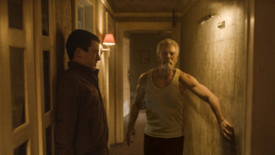 Dylan Minnette (left) and Stephen Lang star in Screen Gems' horror-thriller DON'T BREATHE.