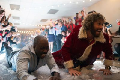 L-R: Courtney B. Vance as Walter, T.J. Miller as Clay Vanstone in OFFICE CHRISTMAS PARTY by Paramount Pictures, DreamWorks Pictures, and Reliance Entertainment